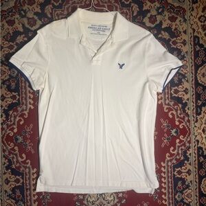 American Eagle Outfitters Men's Cream Polo Shirt with Blue Accents